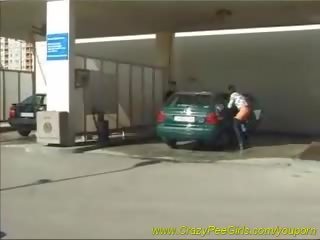 Peeing at car wash